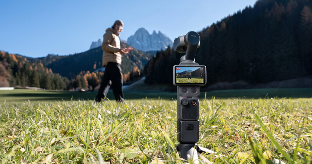 The rotatable display of the DJI Osmo Pocket 4 highlighting a locked subject via ActiveTrack 7.0.