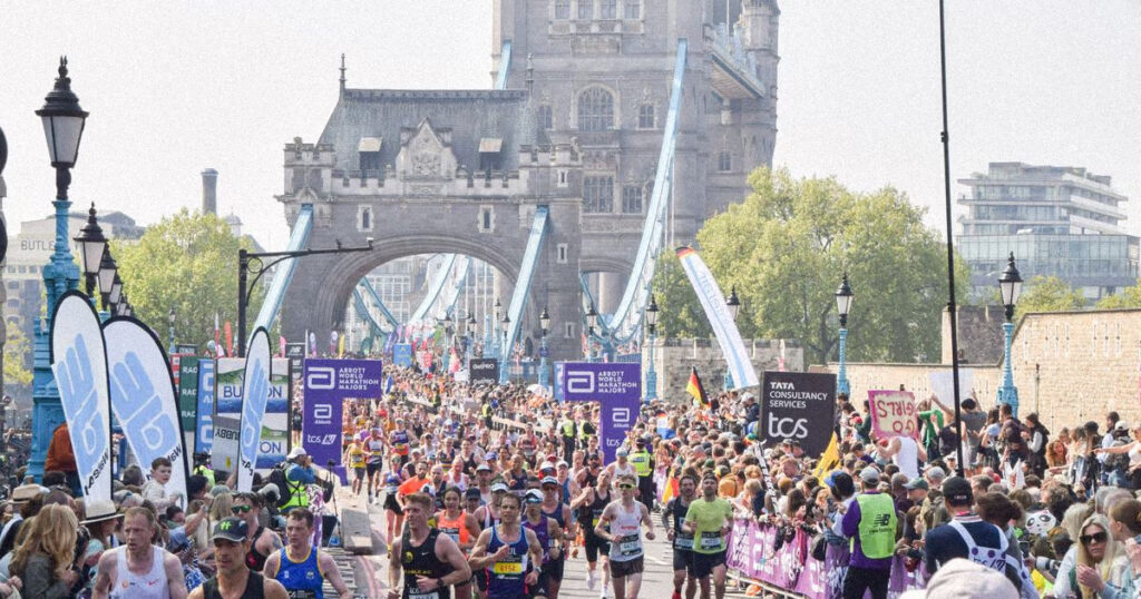 Excited fans watching the race via London Marathon 2026 free streams on their mobile devices
