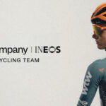 Team cars displaying branding for the new Ineos cycling AI partnership.