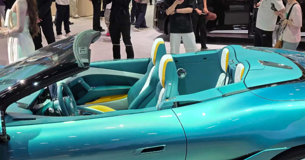 Denza Z electric hypercar interior with floating screen and wireless charging console