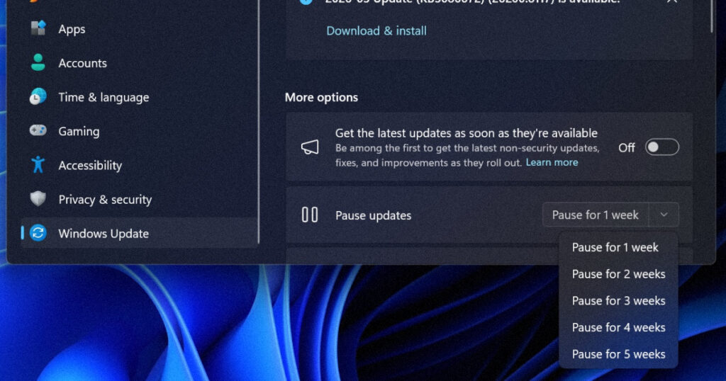 Windows 11 update pause feature in Settings showing calendar interface to delay updates indefinitely