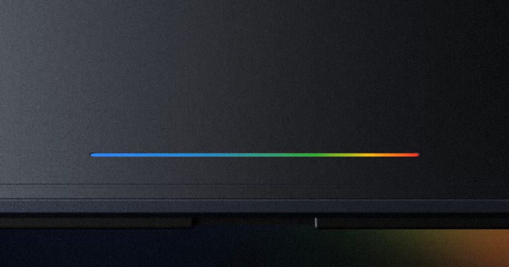 A sleek laptop lid featuring a thin, multicolored light strip called the Glowbar that pulses with Google colors.