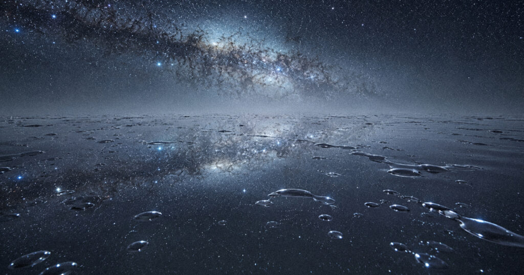 A perfectly flat, infinite landscape made of liquid mercury that perfectly reflects the Milky Way galaxy