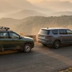 Two SUVs parked side by side on a hill road, showing the idea of a Tata Sierra based Jeep SUV