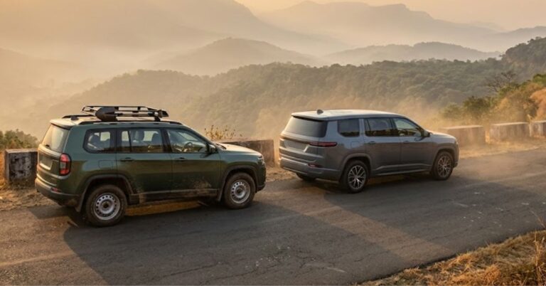 Two SUVs parked side by side on a hill road, showing the idea of a Tata Sierra based Jeep SUV